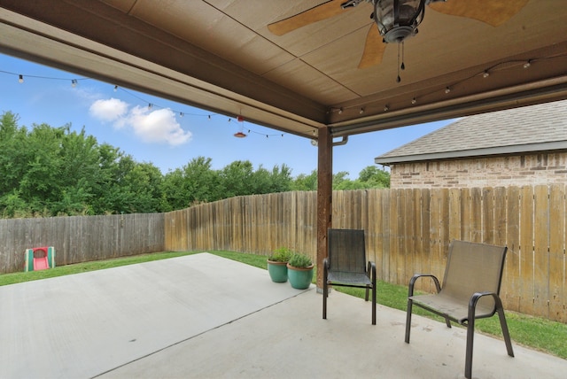 616 Zachary Dr, Weatherford, TX 76087 - fenced backyard with ceiling fan and a patio