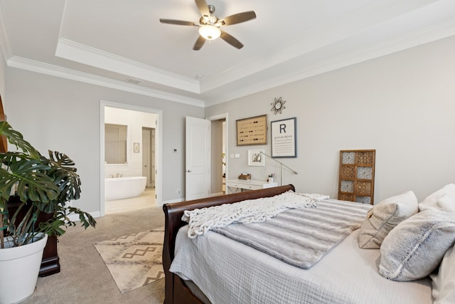 925 Glen Lake Dr, Southlake, TX 76092 - bedroom featuring a tray ceiling, carpet floors, ornamental molding, ensuite bathroom, and ceiling fan