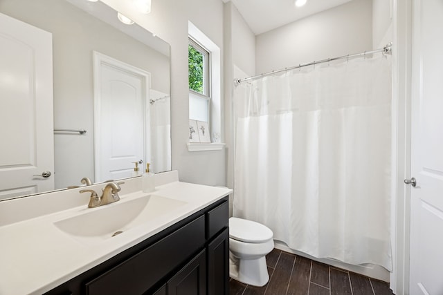 925 Glen Lake Dr, Southlake, TX 76092 - full bathroom with vanity, wood finished floors, a shower with curtain, and recessed lighting