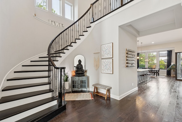 925 Glen Lake Dr, Southlake, TX 76092 - stairway featuring wood finished floors and a towering ceiling
