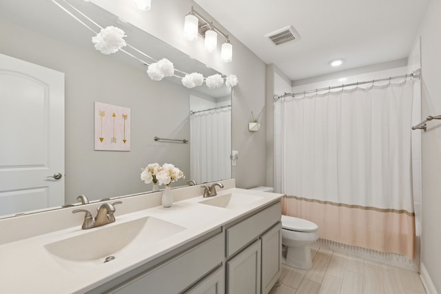 925 Glen Lake Dr, Southlake, TX 76092 - full bathroom featuring toilet and double vanity