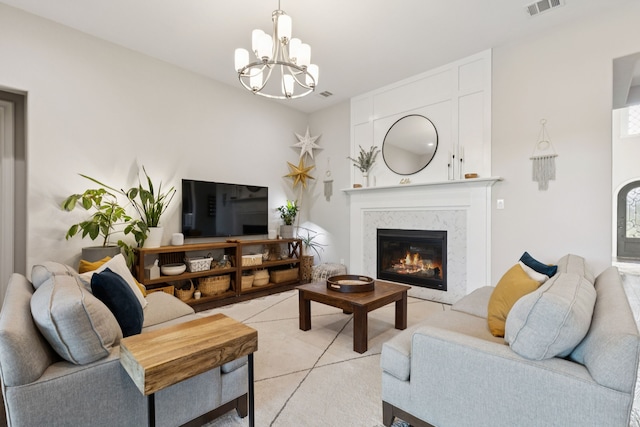 925 Glen Lake Dr, Southlake, TX 76092 - living area with a chandelier, a fireplace, and light tile patterned floors