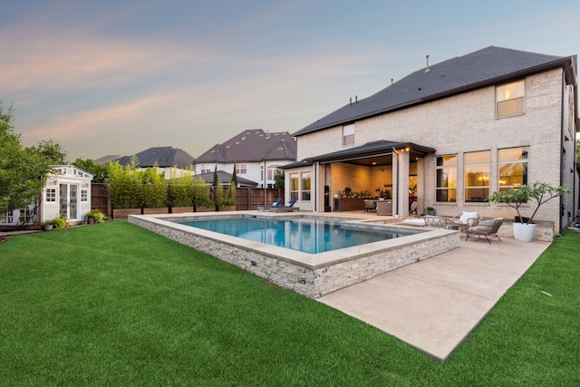 925 Glen Lake Dr, Southlake, TX 76092 - pool at dusk featuring a patio area, a fenced backyard, an outdoor structure, and outdoor lounge area