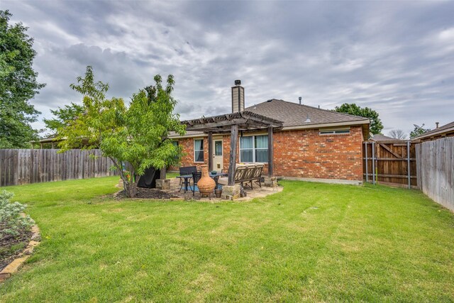 2012 Falls Creek Dr, Little Elm, TX 75068 - back of property with a pergola, brick siding, a chimney, and a patio area