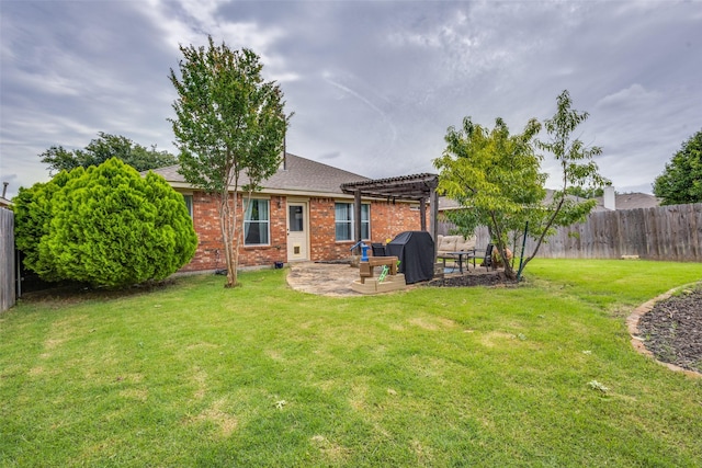 2012 Falls Creek Dr, Little Elm, TX 75068 - rear view of house with a pergola, brick siding, a patio, and roof with shingles