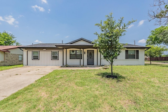 509 Twilight Dr, Garland, TX 75040 - single story home featuring concrete driveway and a front yard