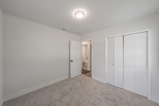 509 Twilight Dr, Garland, TX 75040 - unfurnished bedroom with carpet, baseboards, and a closet