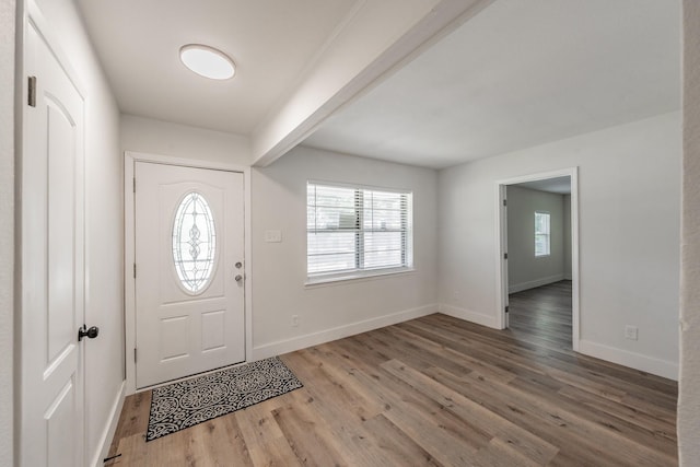 509 Twilight Dr, Garland, TX 75040 - foyer with baseboards and wood finished floors