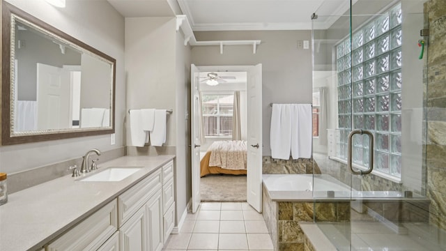 1607 Woodstream Ln, Allen, TX 75002 - bathroom with ornamental molding, vanity, a garden tub, tile patterned floors, and a ceiling fan