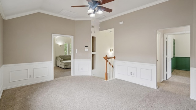 1607 Woodstream Ln, Allen, TX 75002 - unfurnished bedroom with carpet flooring, wainscoting, crown molding, vaulted ceiling, and a ceiling fan
