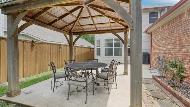 1607 Woodstream Ln, Allen, TX 75002 - view of patio / terrace with a gazebo and outdoor dining area
