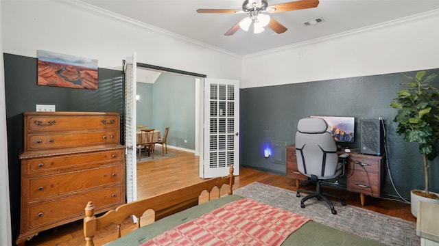 1607 Woodstream Ln, Allen, TX 75002 - bedroom featuring wood finished floors, ornamental molding, ceiling fan, and baseboards