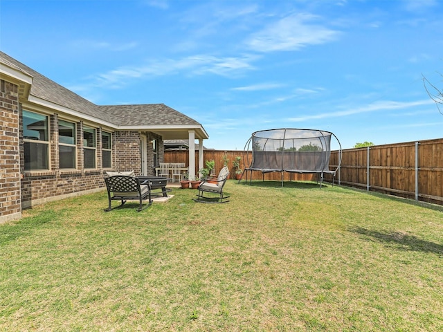 2624 Rambling Rd, Celina, TX 75009 - fenced backyard with a trampoline