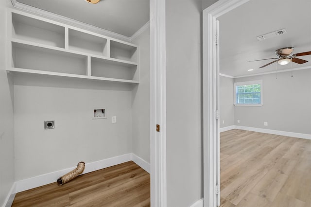 1229 Kiowa Dr E, Lake Kiowa, TX 76240 - washroom with crown molding, electric dryer hookup, a ceiling fan, washer hookup, and wood finished floors