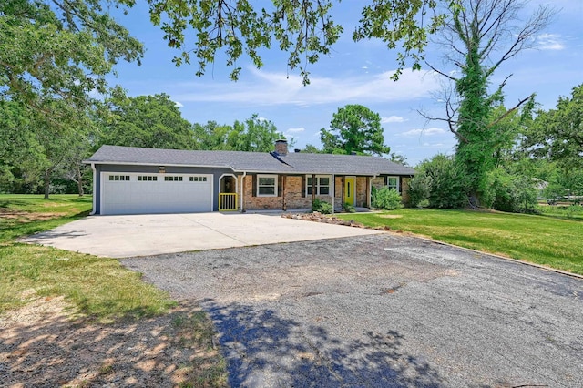 1229 Kiowa Dr E, Lake Kiowa, TX 76240 - ranch-style home featuring a garage, a chimney, concrete driveway, a front yard, and brick siding
