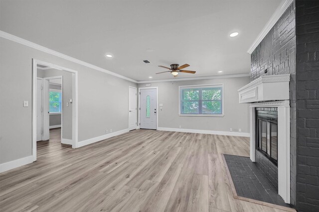 1229 Kiowa Dr E, Lake Kiowa, TX 76240 - unfurnished living room with a fireplace, light wood finished floors, ceiling fan, recessed lighting, and ornamental molding
