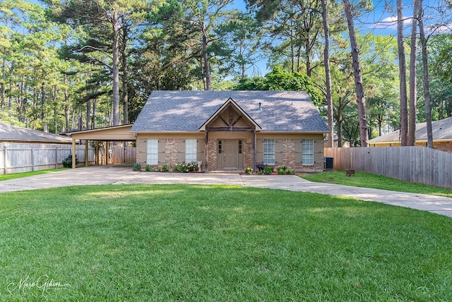 727 Hazelwood Dr, Shreveport, LA 71106 - view of front of home featuring driveway, central AC, a shingled roof, and an attached carport