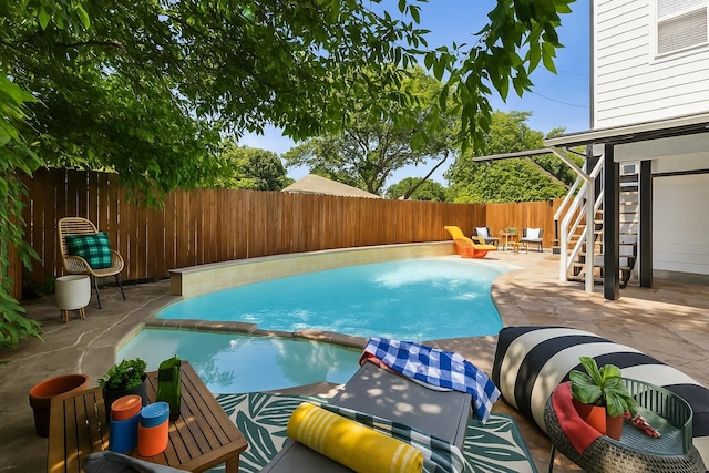 2435 W 10th St, Dallas, TX 75211 - view of pool with a fenced backyard, a patio area, stairs, and a pool with connected hot tub