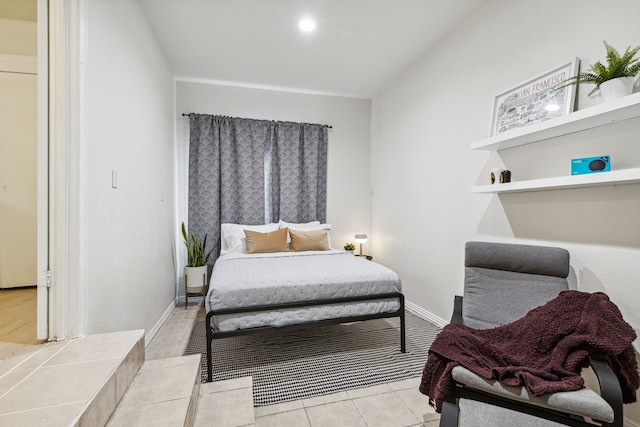 2435 W 10th St, Dallas, TX 75211 - tiled bedroom featuring baseboards