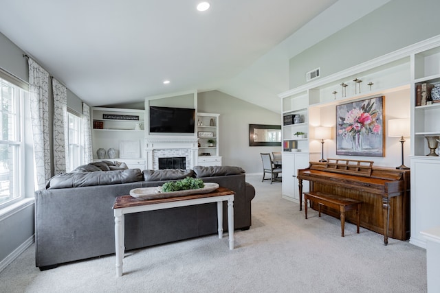 806 Twin View St, Heath, TX 75032 - living area with lofted ceiling, carpet floors, a fireplace, built in features, and baseboards