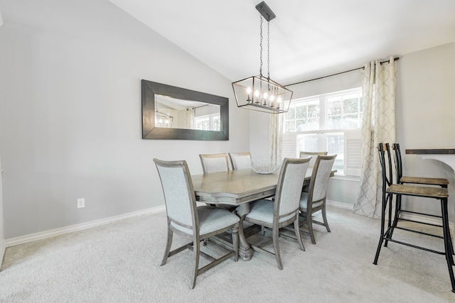 806 Twin View St, Heath, TX 75032 - dining area with light colored carpet, a chandelier, lofted ceiling, and baseboards