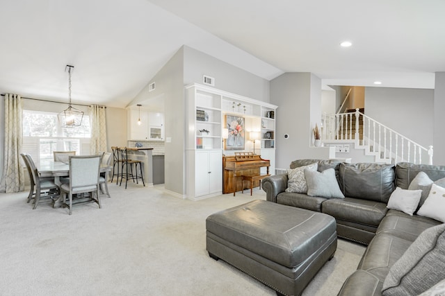 806 Twin View St, Heath, TX 75032 - living room featuring vaulted ceiling, stairway, light colored carpet, and recessed lighting