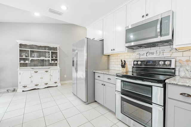 806 Twin View St, Heath, TX 75032 - kitchen with appliances with stainless steel finishes, baseboards, decorative backsplash, open shelves, and recessed lighting