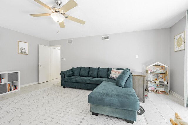 806 Twin View St, Heath, TX 75032 - living area featuring light tile patterned floors, ceiling fan, and baseboards