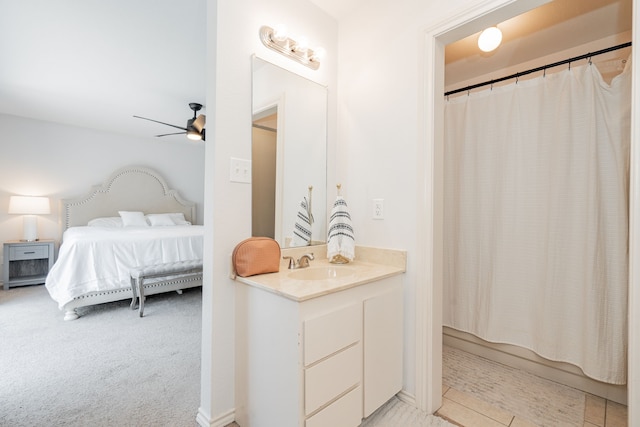 806 Twin View St, Heath, TX 75032 - ensuite bathroom featuring vanity, a ceiling fan, and shower / bath combo with shower curtain