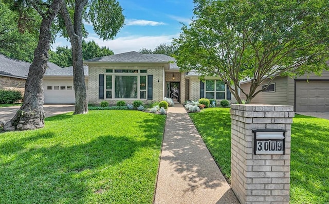 3009 Chimney Hill Dr, Waco, TX 76708 - view of front of house featuring brick siding, a front yard, an attached garage, concrete driveway, and a shingled roof