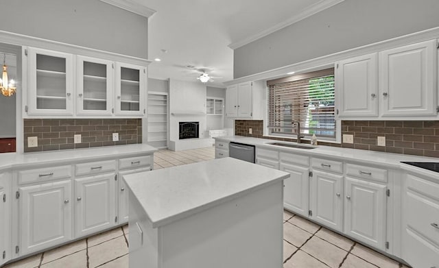 3009 Chimney Hill Dr, Waco, TX 76708 - kitchen featuring a sink, dishwasher, light tile patterned floors, backsplash, and crown molding