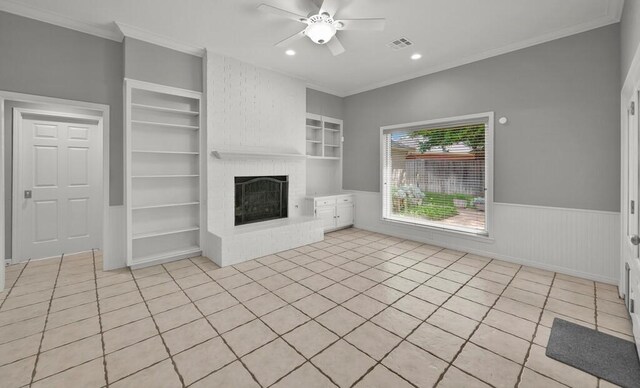 3009 Chimney Hill Dr, Waco, TX 76708 - unfurnished living room featuring built in shelves, a ceiling fan, a brick fireplace, crown molding, and recessed lighting