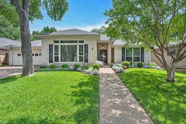 3009 Chimney Hill Dr, Waco, TX 76708 - single story home with brick siding, a garage, a front lawn, a shingled roof, and driveway