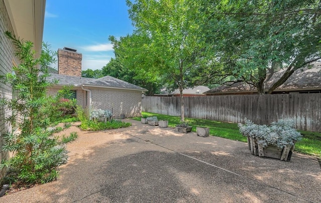 3009 Chimney Hill Dr, Waco, TX 76708 - fenced backyard with a patio