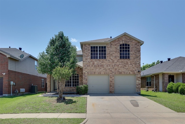 3037 Elmbrook Dr, Grand Prairie, TX 75052 - traditional home with brick siding, an attached garage, driveway, and a front yard