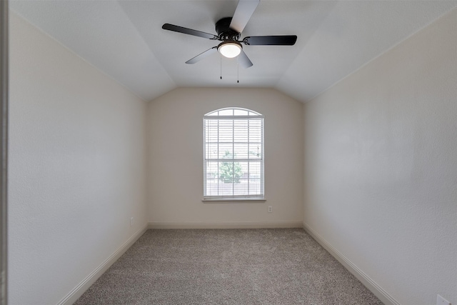 3037 Elmbrook Dr, Grand Prairie, TX 75052 - carpeted spare room featuring a ceiling fan, baseboards, and vaulted ceiling