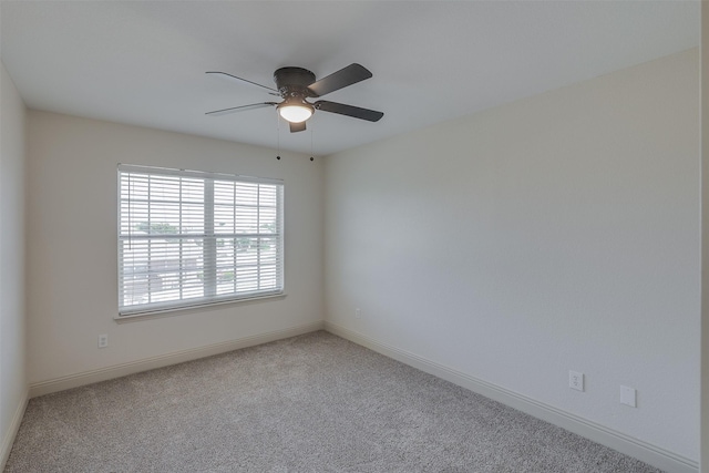 3037 Elmbrook Dr, Grand Prairie, TX 75052 - spare room with carpet, ceiling fan, and baseboards