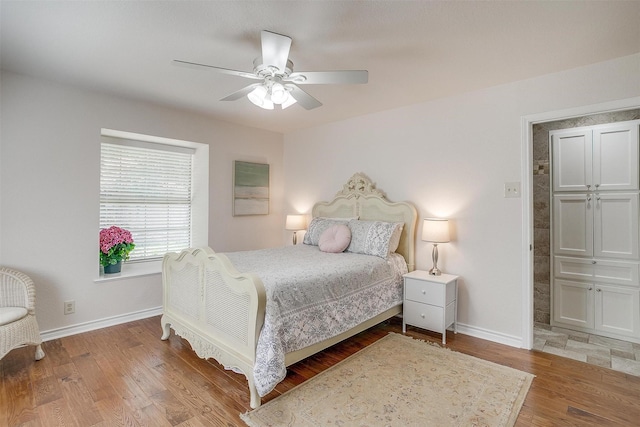 8921 Crest Ridge Dr, Fort Worth, TX 76179 - bedroom featuring wood finished floors, baseboards, and ceiling fan