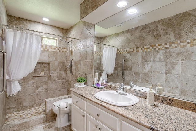 8921 Crest Ridge Dr, Fort Worth, TX 76179 - full bathroom with tile walls, vanity, tiled shower, and toilet