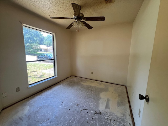 736 Lake Crest Pkwy, Azle, TX 76020 - unfurnished room featuring a ceiling fan, a textured ceiling, and baseboards