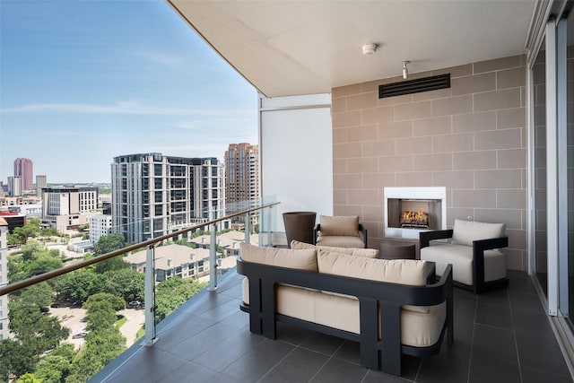 3130 N Harwood St Unit 1804, Dallas, TX 75201 - balcony featuring a view of city and an outdoor living space with a fireplace
