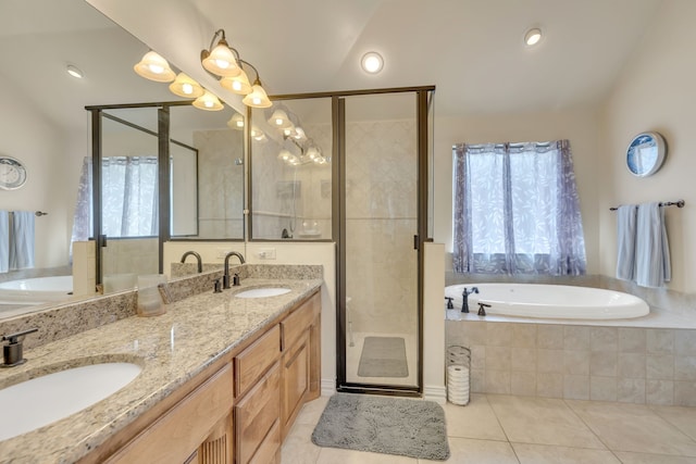 2309 E Emerald Bend Ct, Granbury, TX 76049 - bathroom with a garden tub, tile patterned floors, double vanity, and a stall shower