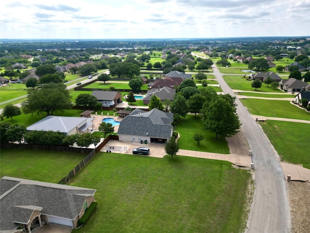 2309 E Emerald Bend Ct, Granbury, TX 76049 - aerial perspective of suburban area with a pool area