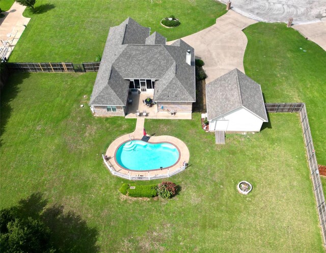 2309 E Emerald Bend Ct, Granbury, TX 76049 - ranch-style house with brick siding, roof with shingles, concrete driveway, and an outbuilding