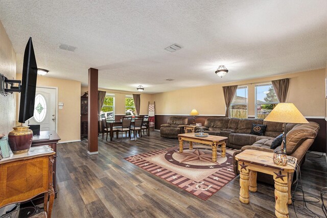 1400 Sunflower Ct, Burleson, TX 76028 - living area with a textured ceiling and wood finished floors