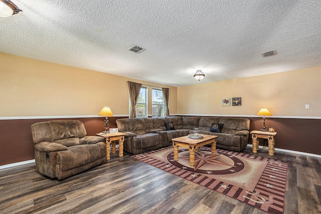 1400 Sunflower Ct, Burleson, TX 76028 - living area featuring wood finished floors, a textured ceiling, and baseboards