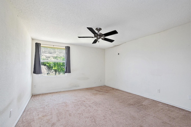 1400 Sunflower Ct, Burleson, TX 76028 - carpeted empty room with a ceiling fan, a textured ceiling, and baseboards