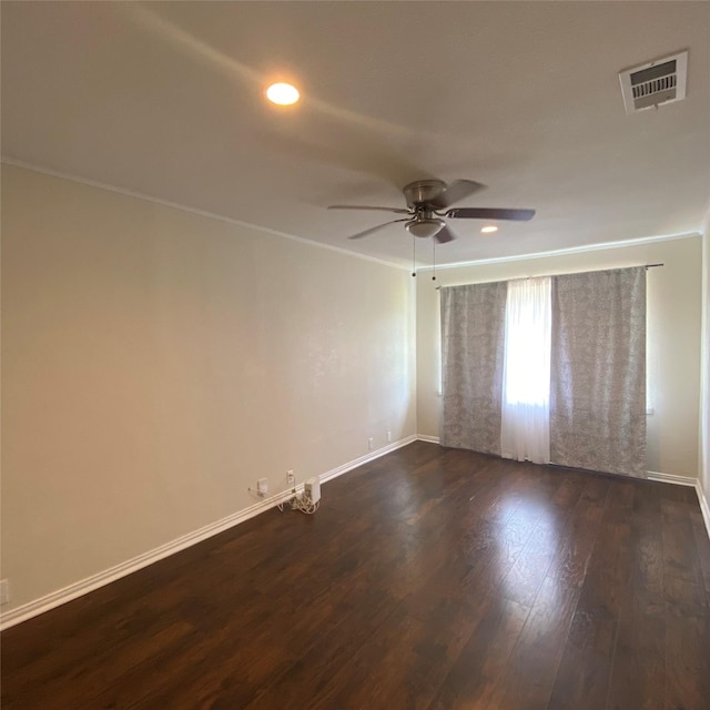 313 Wall St, Terrell, TX 75160 - empty room featuring ceiling fan, baseboards, dark wood-style flooring, recessed lighting, and crown molding