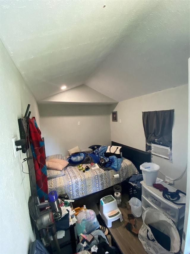313 Wall St, Terrell, TX 75160 - bedroom with wood finished floors and lofted ceiling