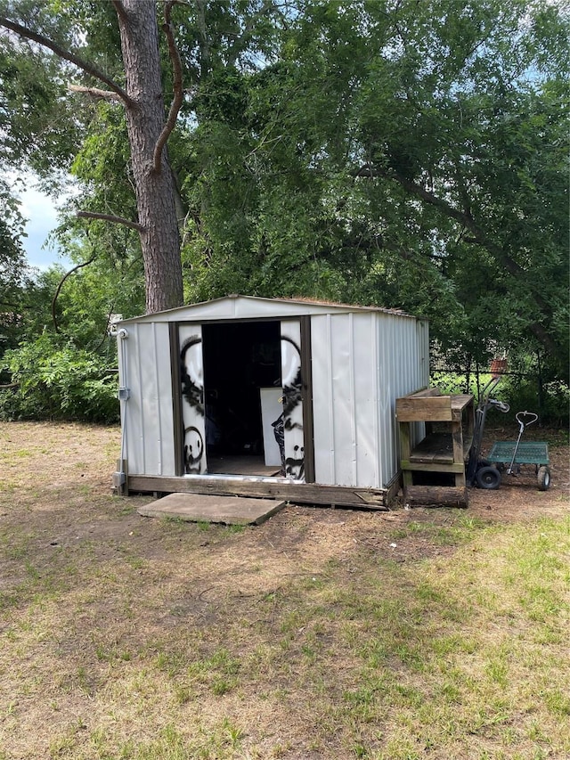 313 Wall St, Terrell, TX 75160 - view of shed with view of wooded area
